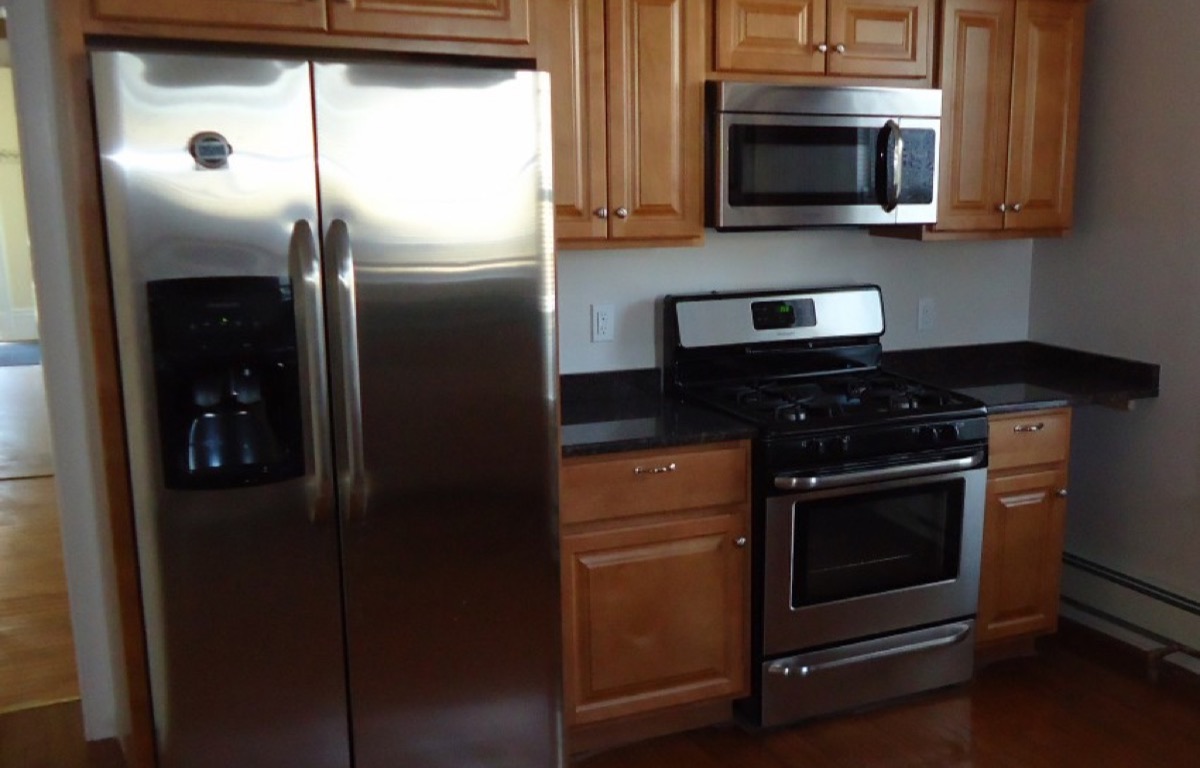 Stainless-steel refrigerator in a newly renovated kitchen