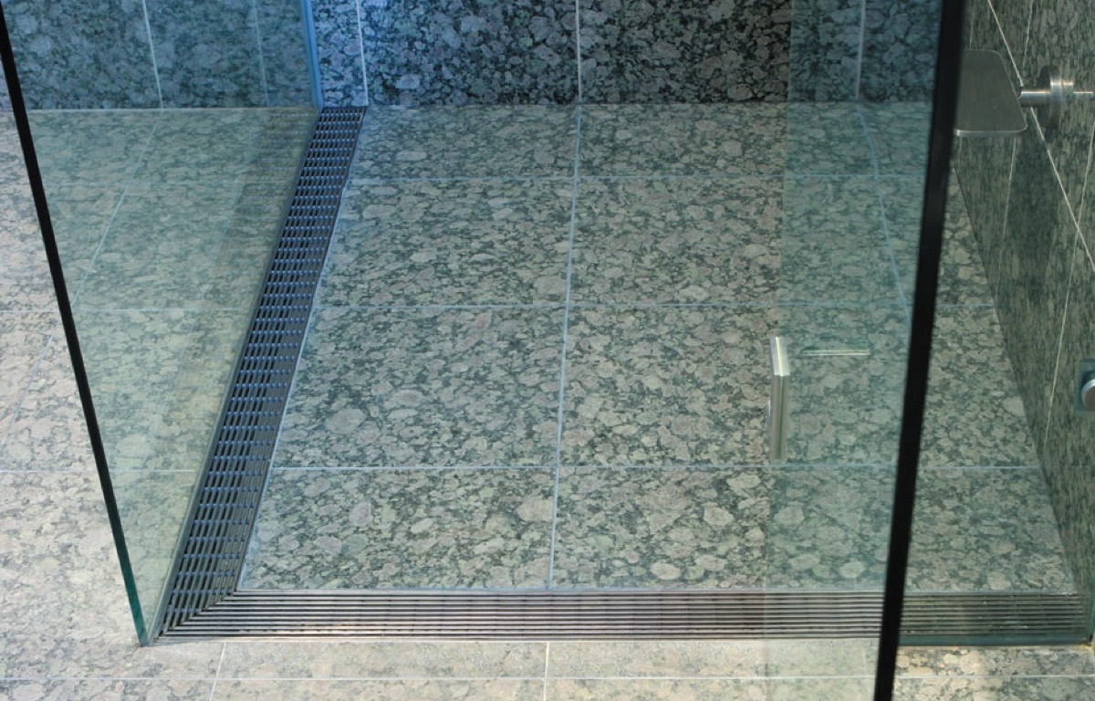 Linear drain set into a tiled shower floor